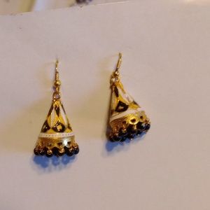 Rich Anthenic carved pattern Earrings.